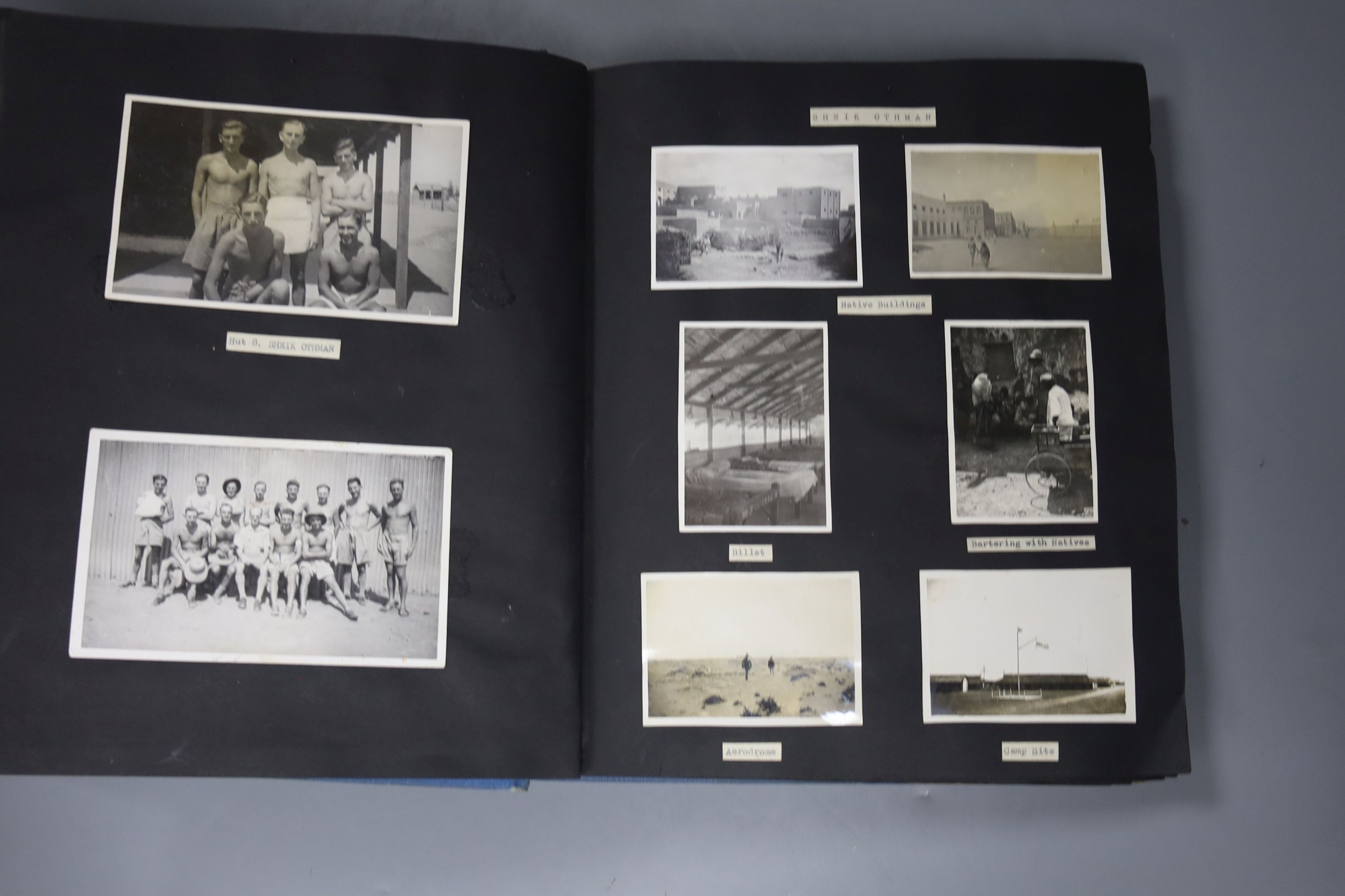 World War II album containing photos of an RAF units travels across Egypt, Saudi Arabia, Palestine, Jerusalem etc. as well as photos of natives, the troops and their equipment and postcards, together with an associated p